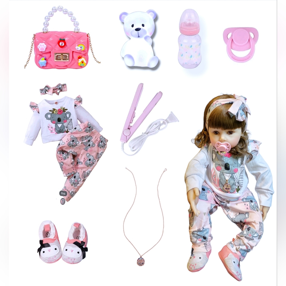 24 inch silicone and wine reborn doll.Realistic.With luxury accessories.